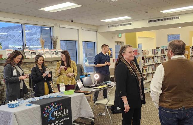 There was plenty of help to explain the new Telehealth Program at the launch at the Greenhorn Valley Library on March 7. Photo by Shirley Pigg