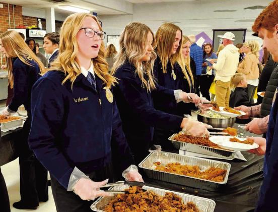 The Rye FFA members were busy serving their famous Rocky Mountain Oysters with all the trimmings. Photo by Shirley Pigg